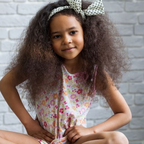 little girl with bow in hair