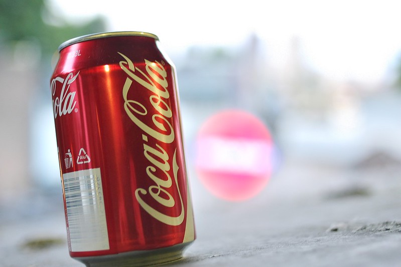 A can of coca-cola, presumably to be used as a lice treatment.