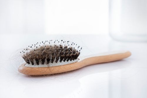 hairbrush with lice needing to be cleaned