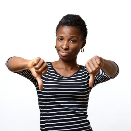 woman with two thumbs doen indicating that neem lice treatment is not effective