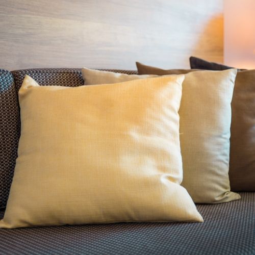 Three Throw Pillows on a couch