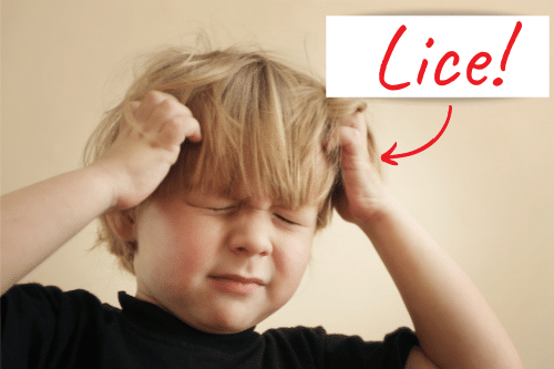 little boy scratching his head, appears frustrated