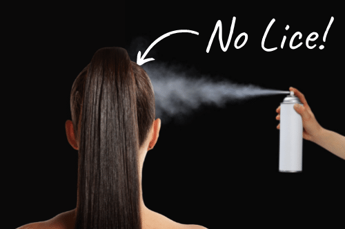 brunette spraying hair with aerosol spray to prevent lice