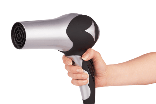 holding a blow dryer with one hand