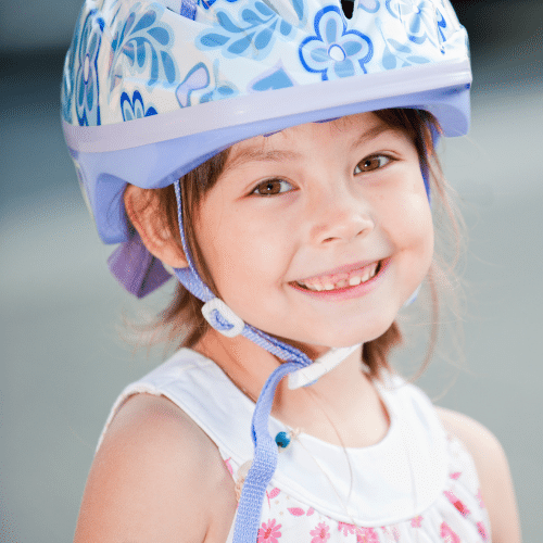 child with lice wearing a helmet