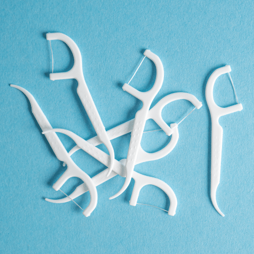 dental floss or "flossers" used to clean lice comb