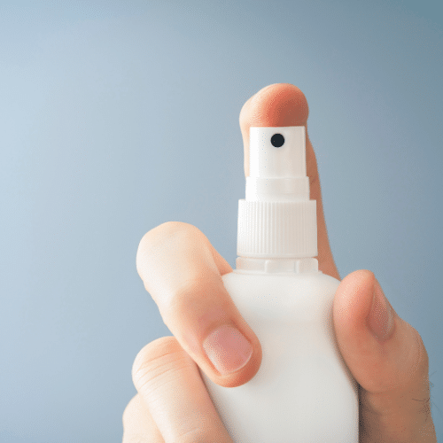 a bottle of lice presumably of lice repelling spray for stuffed animals